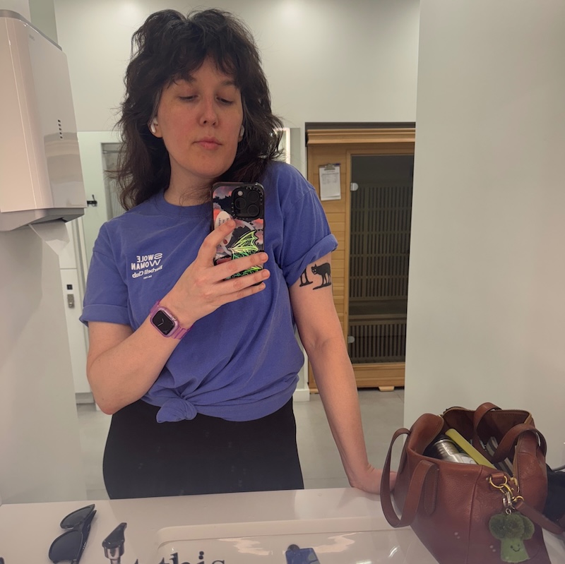 gym locker room mirror selfie of me wearing "she's a beast" merch