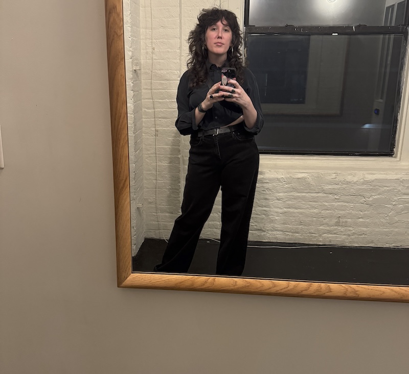 mirror selfie in the elevator alcove of Index. i'm dressed in all black and it's nighttime outside