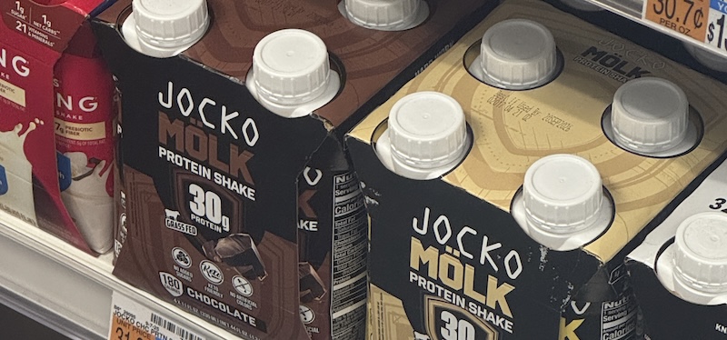 photo of a shelf at cvs of small bottles of "jocko molk" protein drinks
