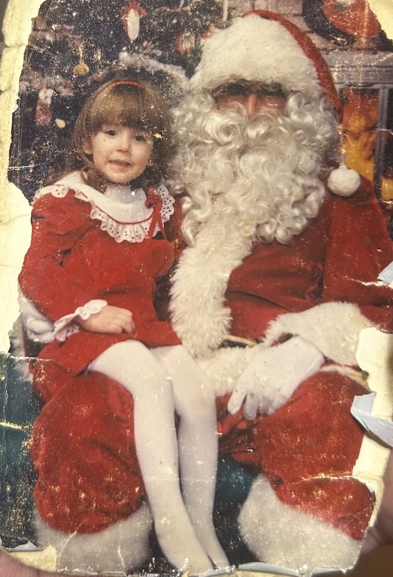 photo of an old wallet sized photo of me when i was 3 or 4 sitting on santa's lap