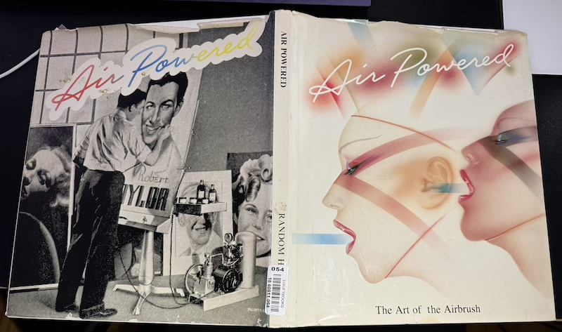 photo of the front and back cover of the book "air powered: the art of the airbrush"