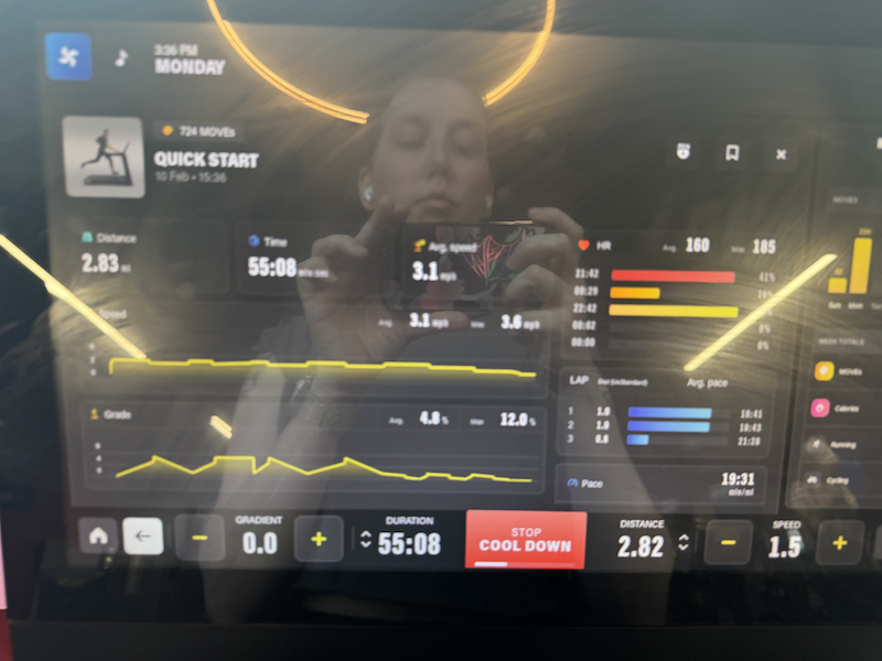 photo of the treadmill at the end of my hour-ish long workout and you can see my face in the reflection