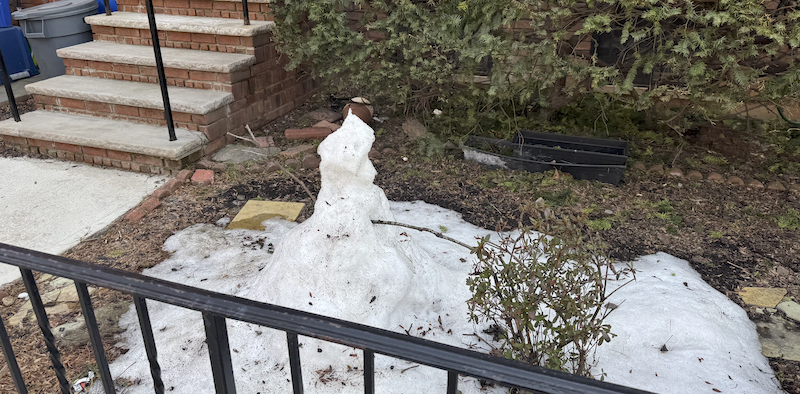 photo of a snowman i've shown in prior weeks, but it's like a day away from being fully melted