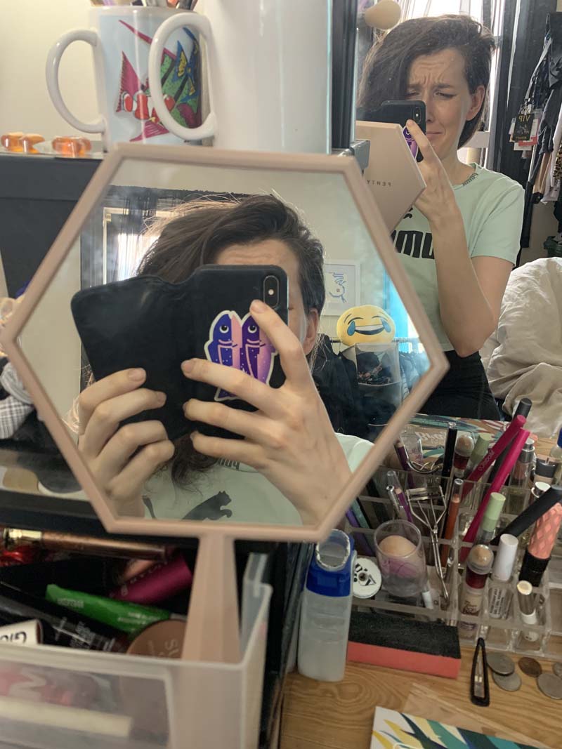 photo of my vanity showing my mirror is positioned inside an open drawer