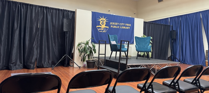 the empty stage at a jersey city free public library event