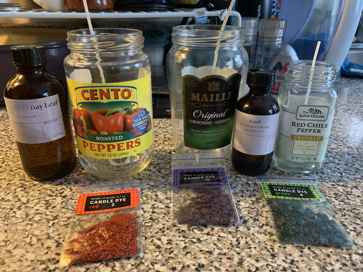 photo of some condiment jars, dye flakes, and fragrance oils on my kitchen counter