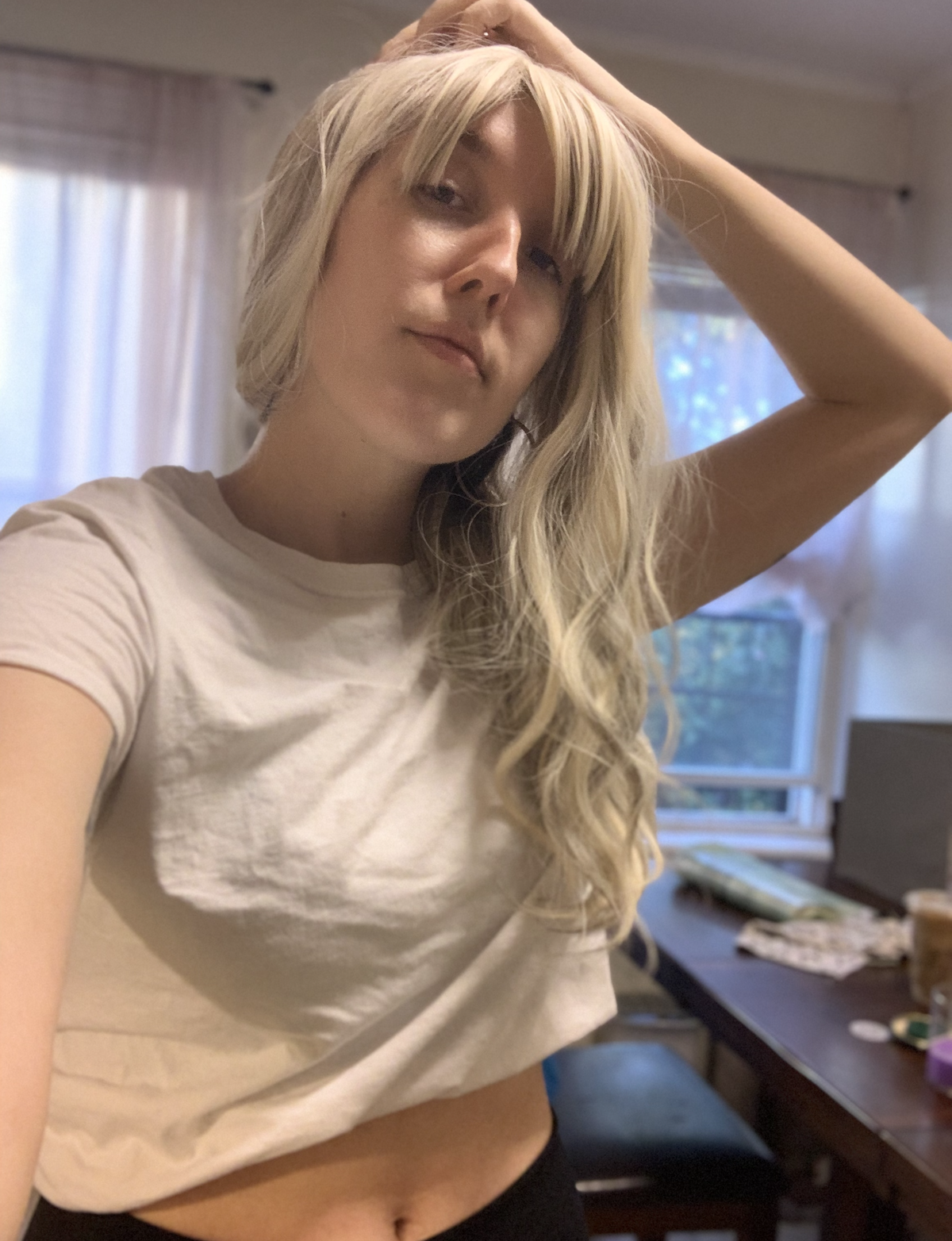 photo of me with a long blonde wavy wig on