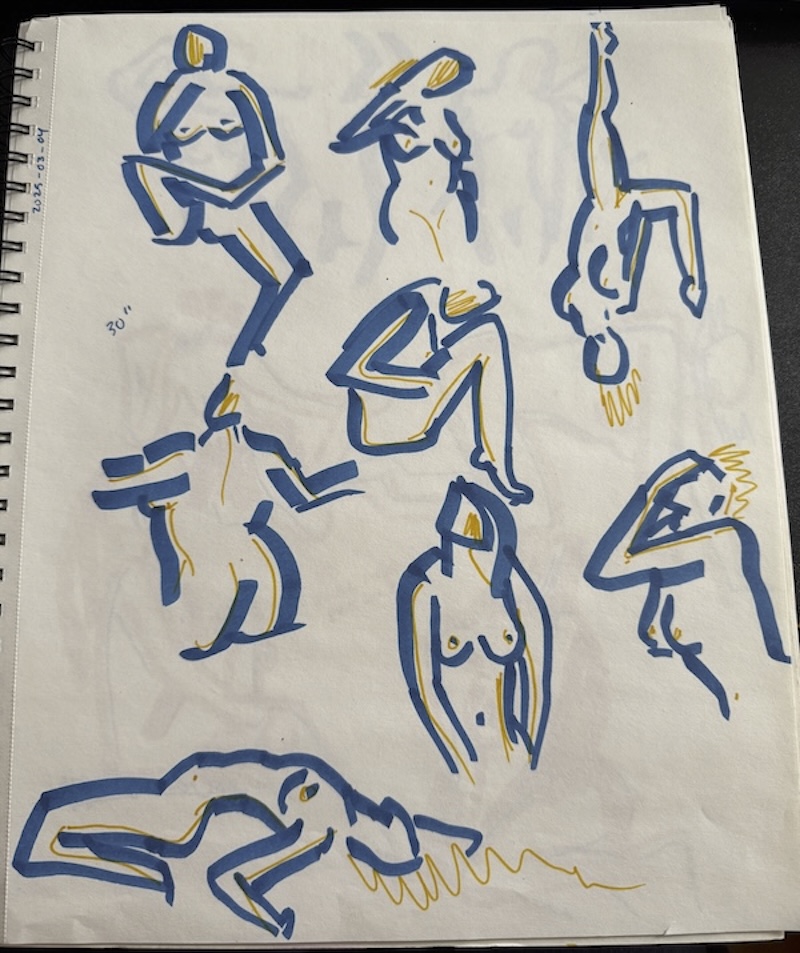 photo of another page of my sketchbook where i did quick sketches in blue with yellow accents