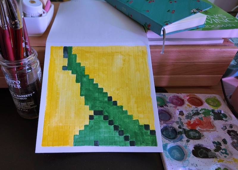 photo of pixel watercolor sketchbook on page 14, pixel painting of a green pinup girl's (well, really, gumby's) legs, one with a foot pointing up