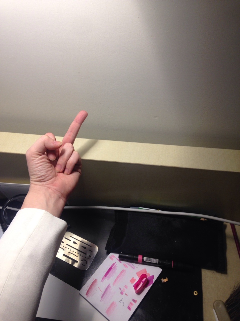 me giving the middle finger to the back of my desk and the gap between it and the wall